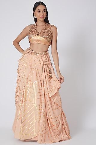 sunburst pink lehenga set with gold foil work