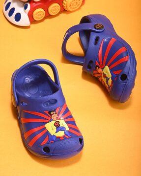 superman embossed slingback clogs