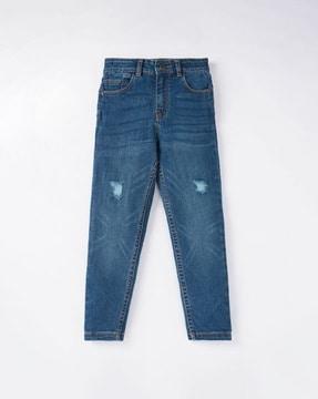 sustainable lightly washed distressed jeans
