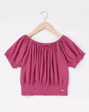 sustainable waist-length smocked top