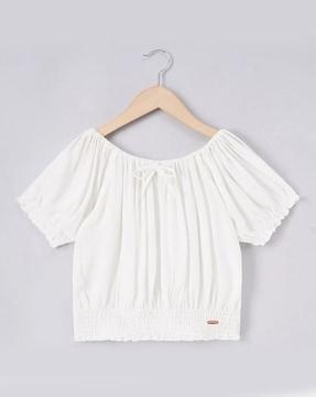 sustainable waist-length smocked top