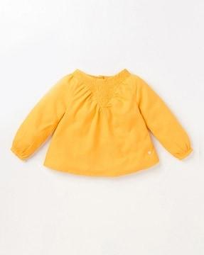 sustainable top with smocked panel
