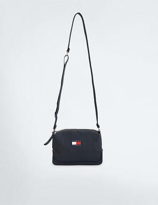 sustainable uncovered sling bag