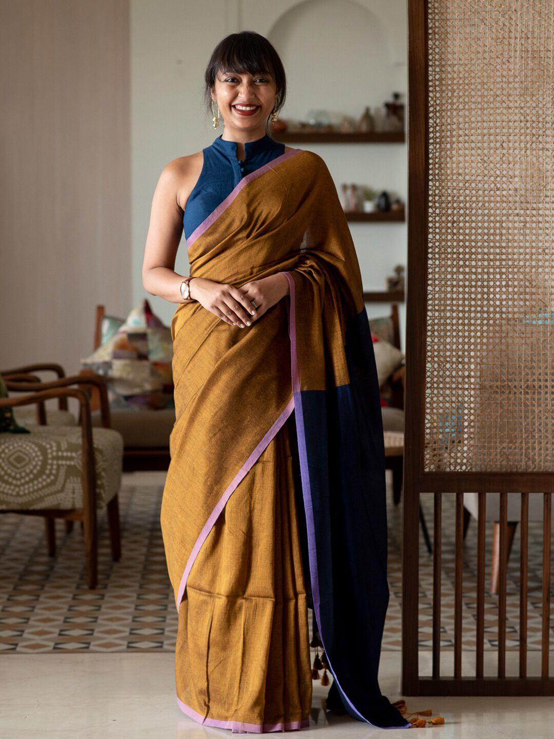 suta gold-toned & blue saree with tassels