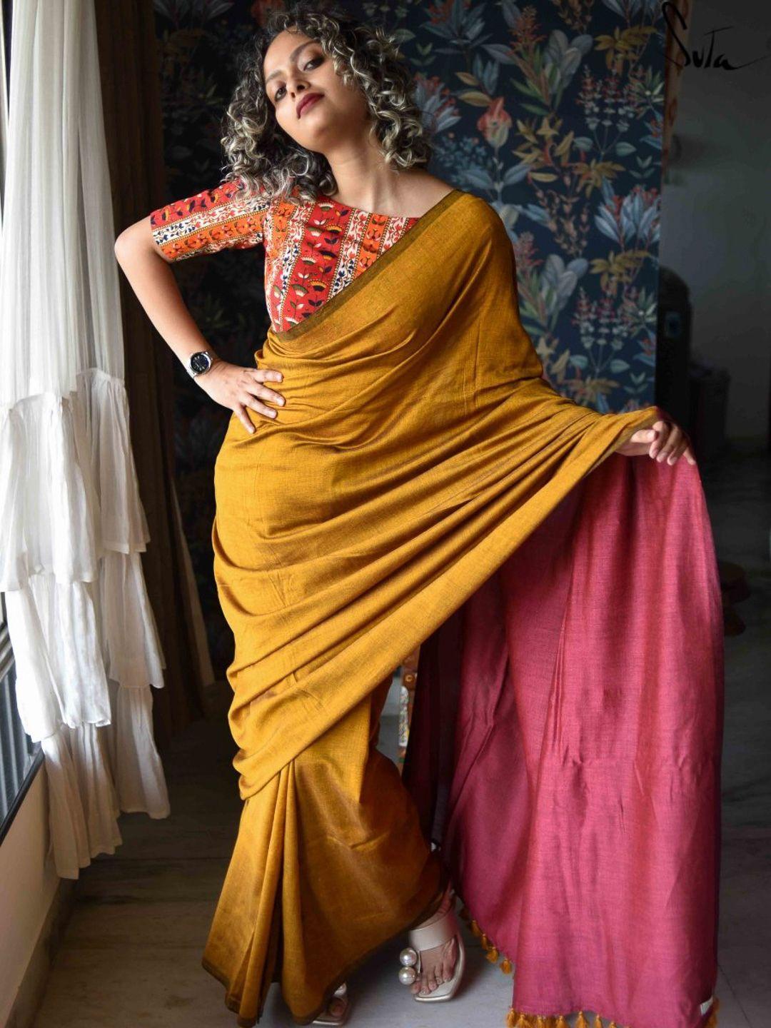 suta gold-toned & rust red colourblocked saree