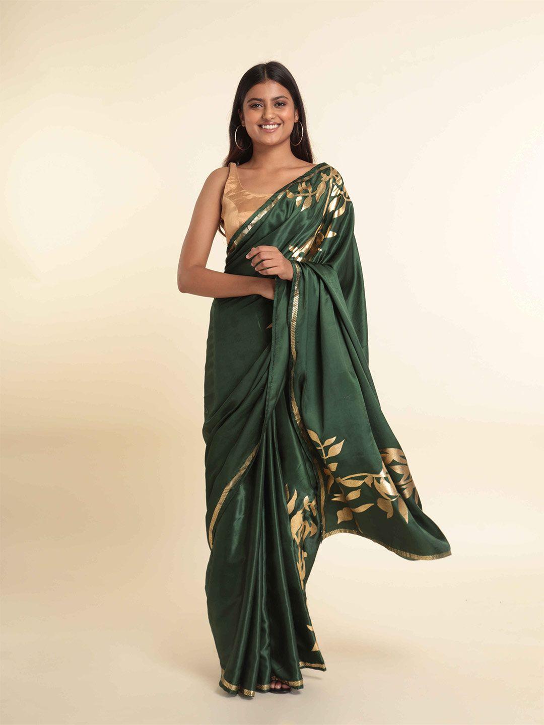 suta green & gold-toned floral printed saree