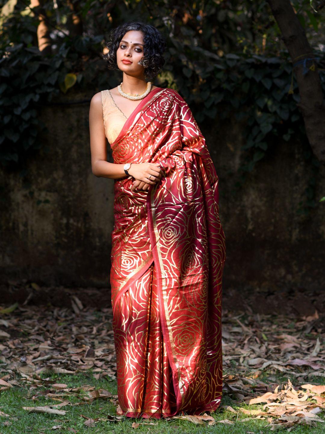 suta red & gold-toned floral printed saree