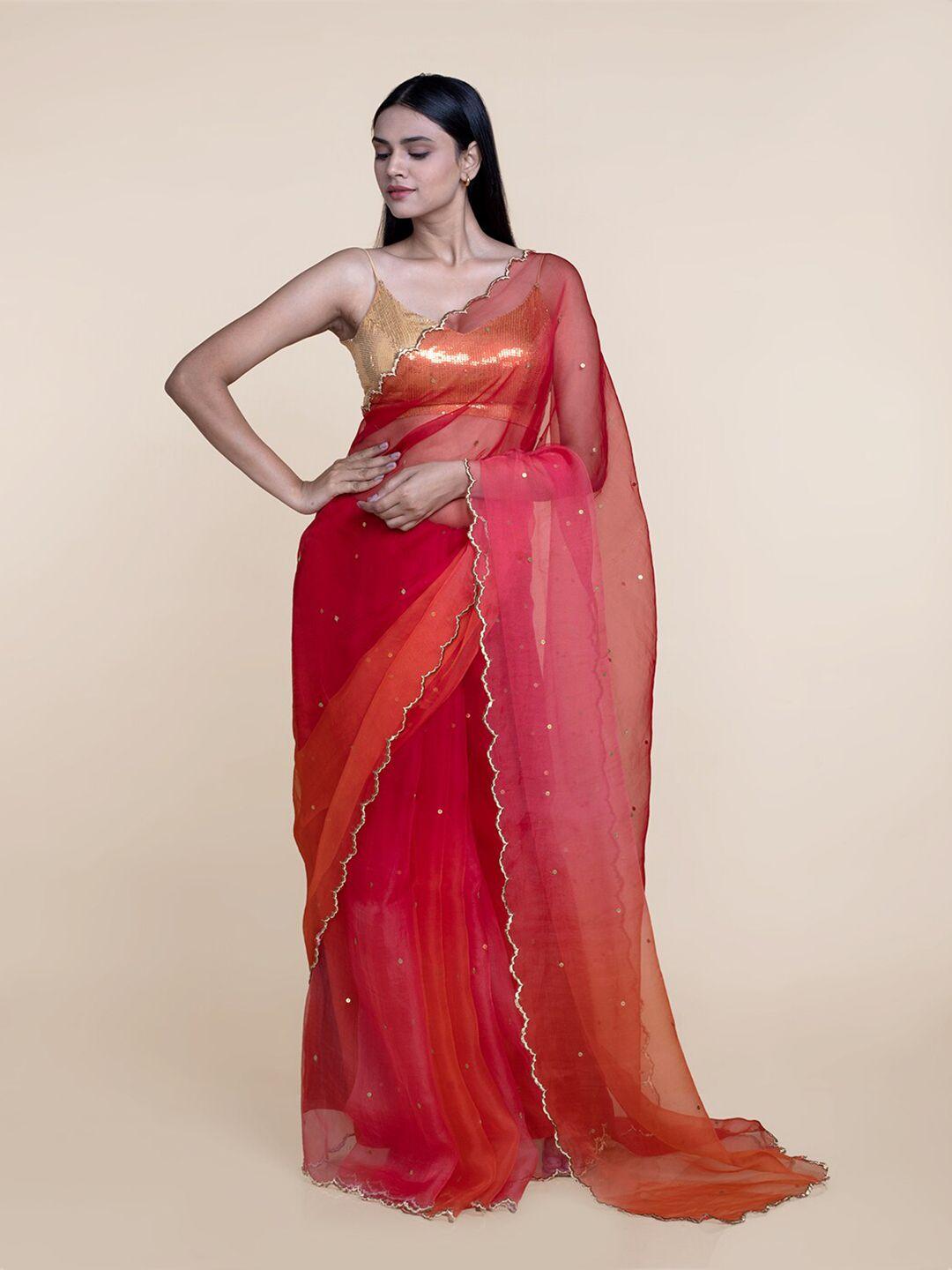 suta women orange & pink sequinned silk blend saree