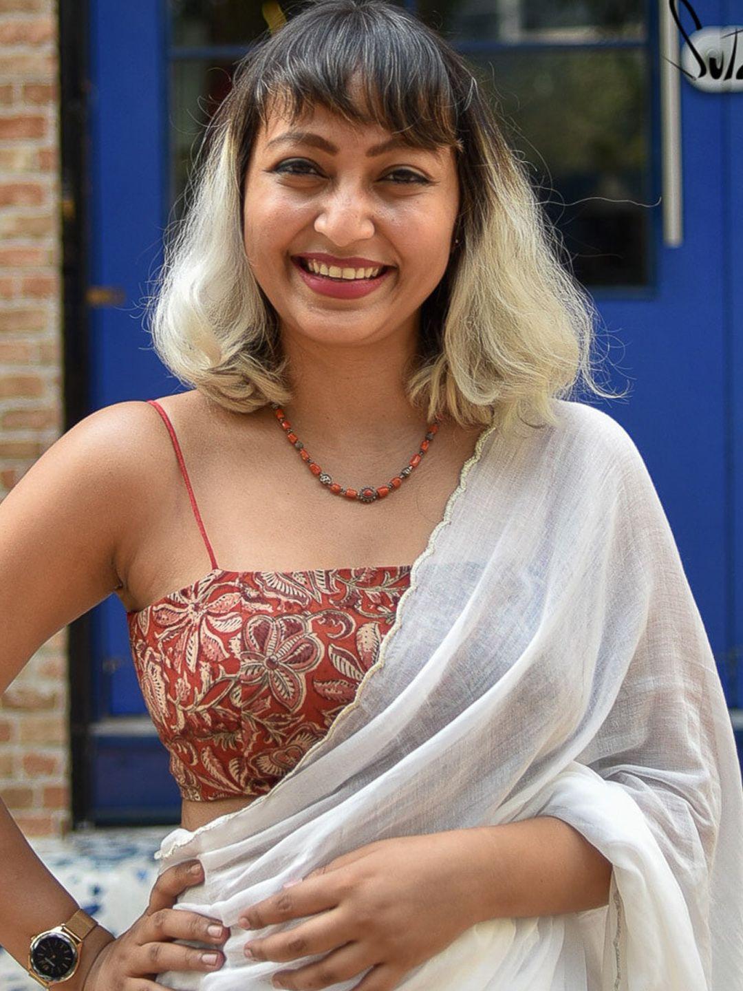 suta women orange kalamkari printed cotton saree blouse