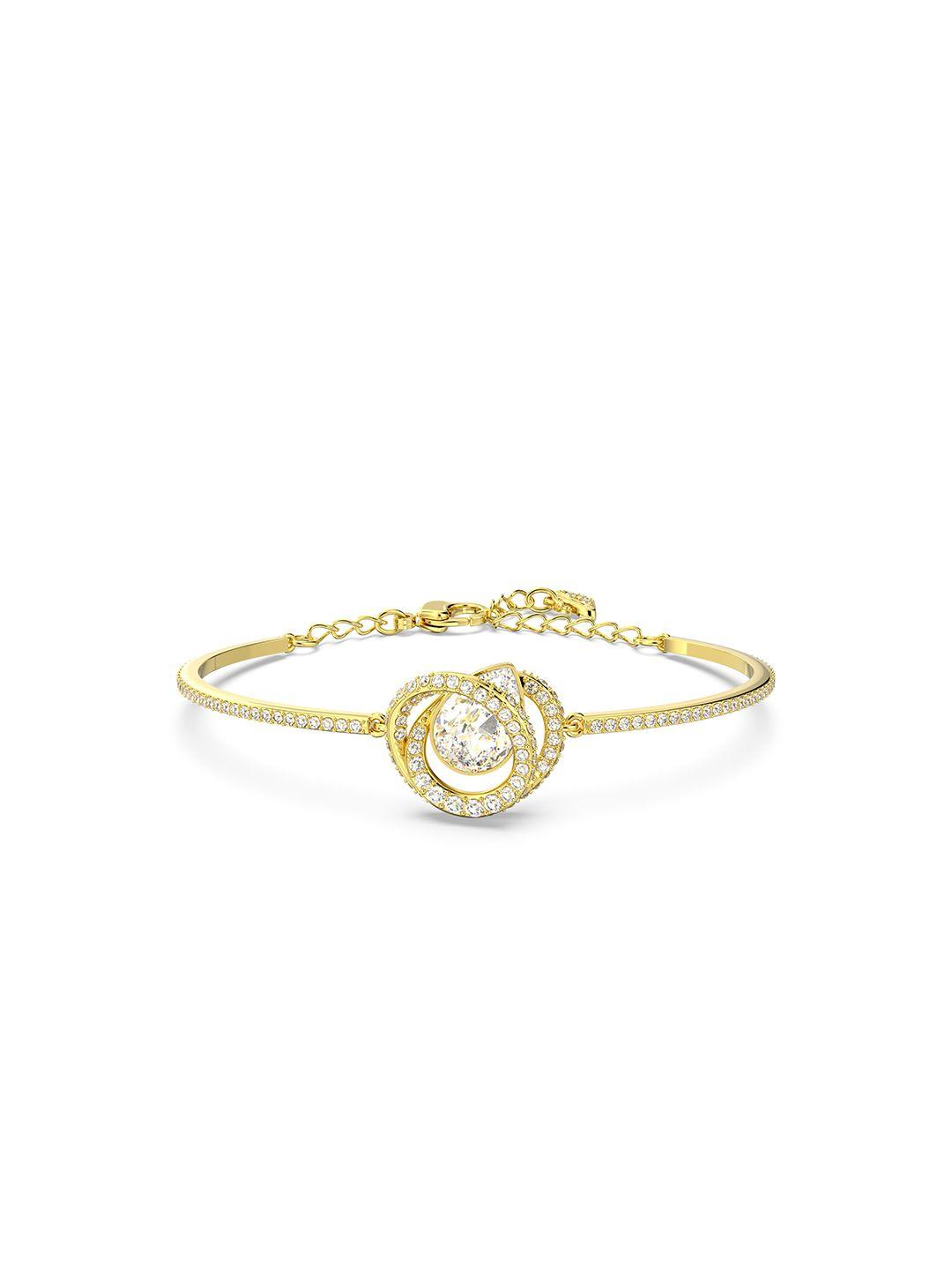 swarovski women gold-toned & white crystals gold-plated wraparound bracelet