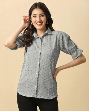 swiss-dot shirt with puffed sleeves