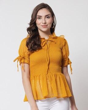 swiss dot smocked peplum top