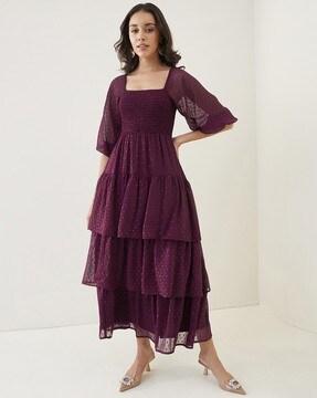 swiss-dot smocked tiered midi dress