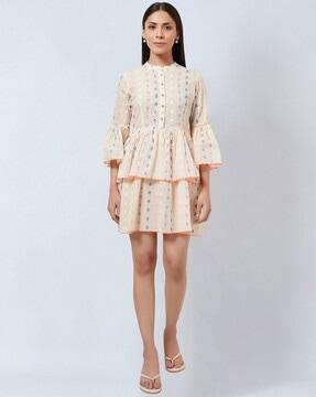 swiss dot tiered dress with bell sleeves