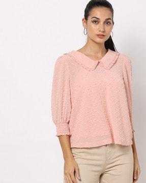 swiss-dot top with puff sleeves