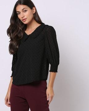 swiss-dot top with puff sleeves