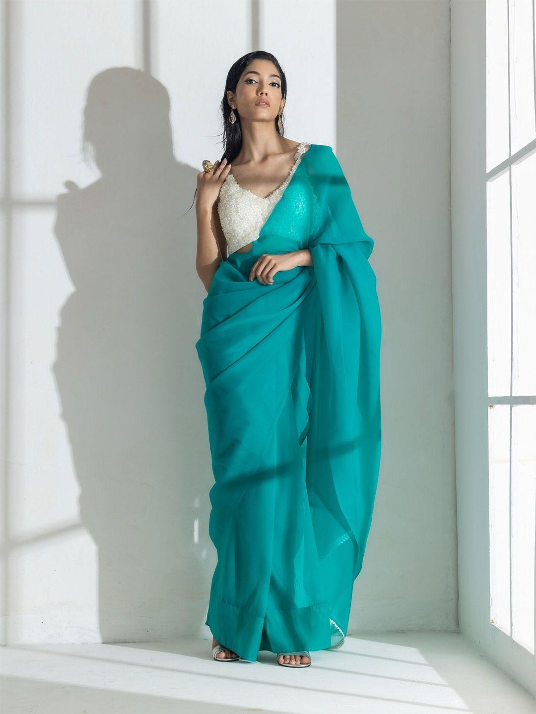 swtantra green beads and stones organza saree