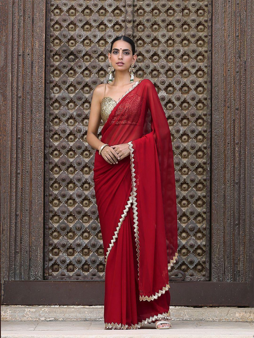swtantra red sequinned pure georgette saree