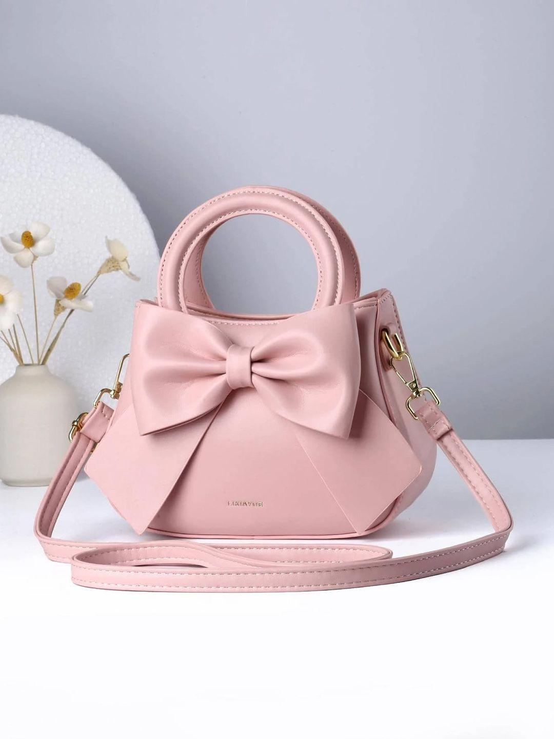 syga leather bucket handheld bag with bow detail
