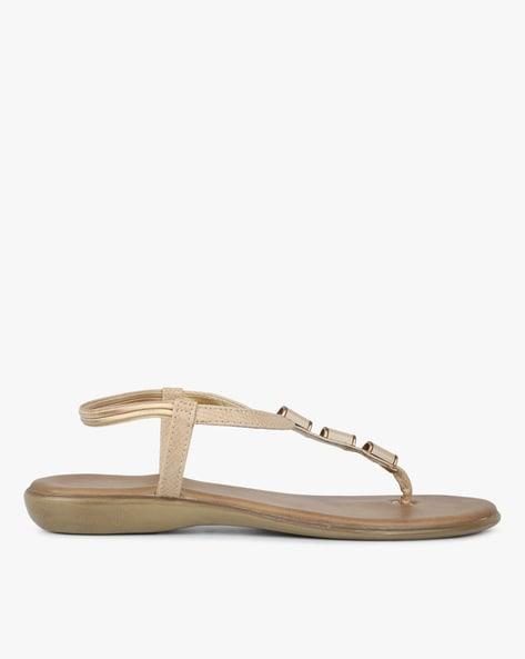 t-strap flat sandals with metal accent