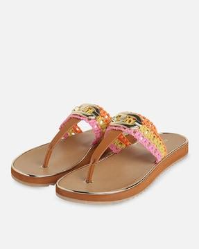 t-strap sandals with metal accent