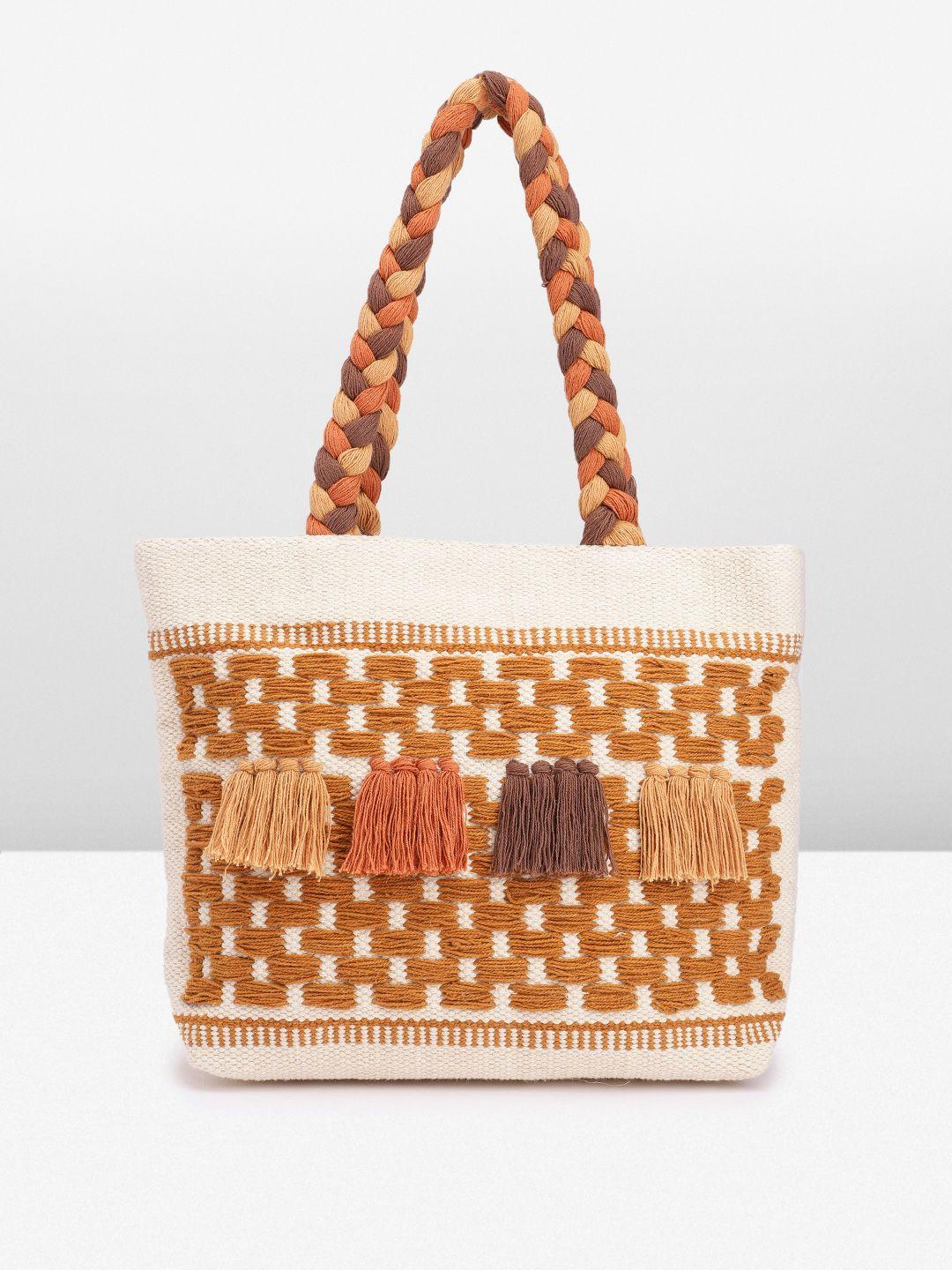 taavi woven design textured shoulder bag with tasselled