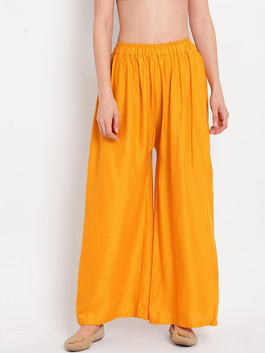 tag 7 women mustard yellow solid flared palazzos