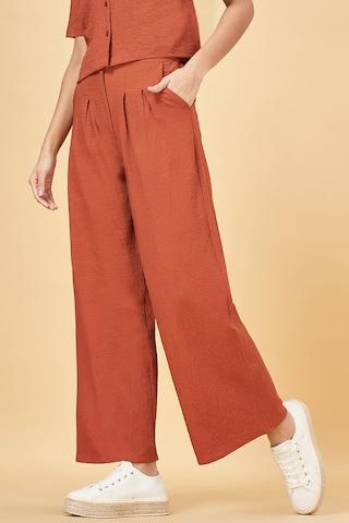 tan solid polyester spandex women relaxed fit trousers