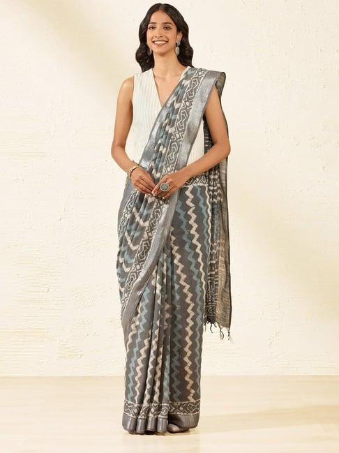 taneira grey printed saree with unstiched blouse