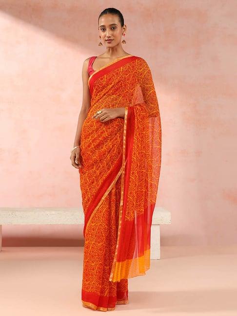 taneira yellow printed saree with unstitched blouse piece