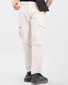 tapered fit flat-front pants with drawstring waist