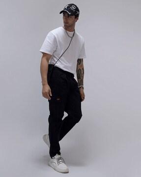 tapered fit flat front pants with insert pockets