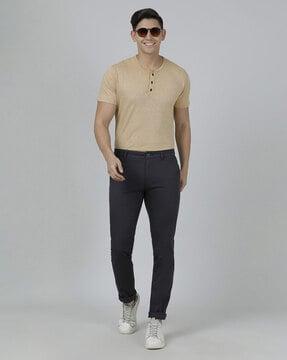 tapered fit flat-front trousers