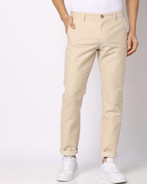 tapered fit flat-front trousers