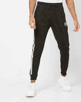 tapered fit joggers with contrast stripes