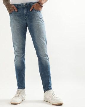 tapered fit mid-rise jeans