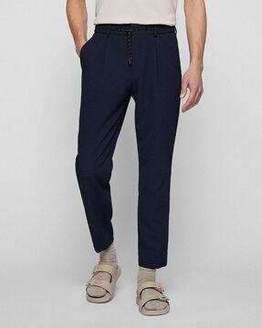 tapered fit pleated seersucker trousers