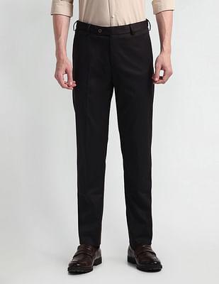 tapered fit solid trousers