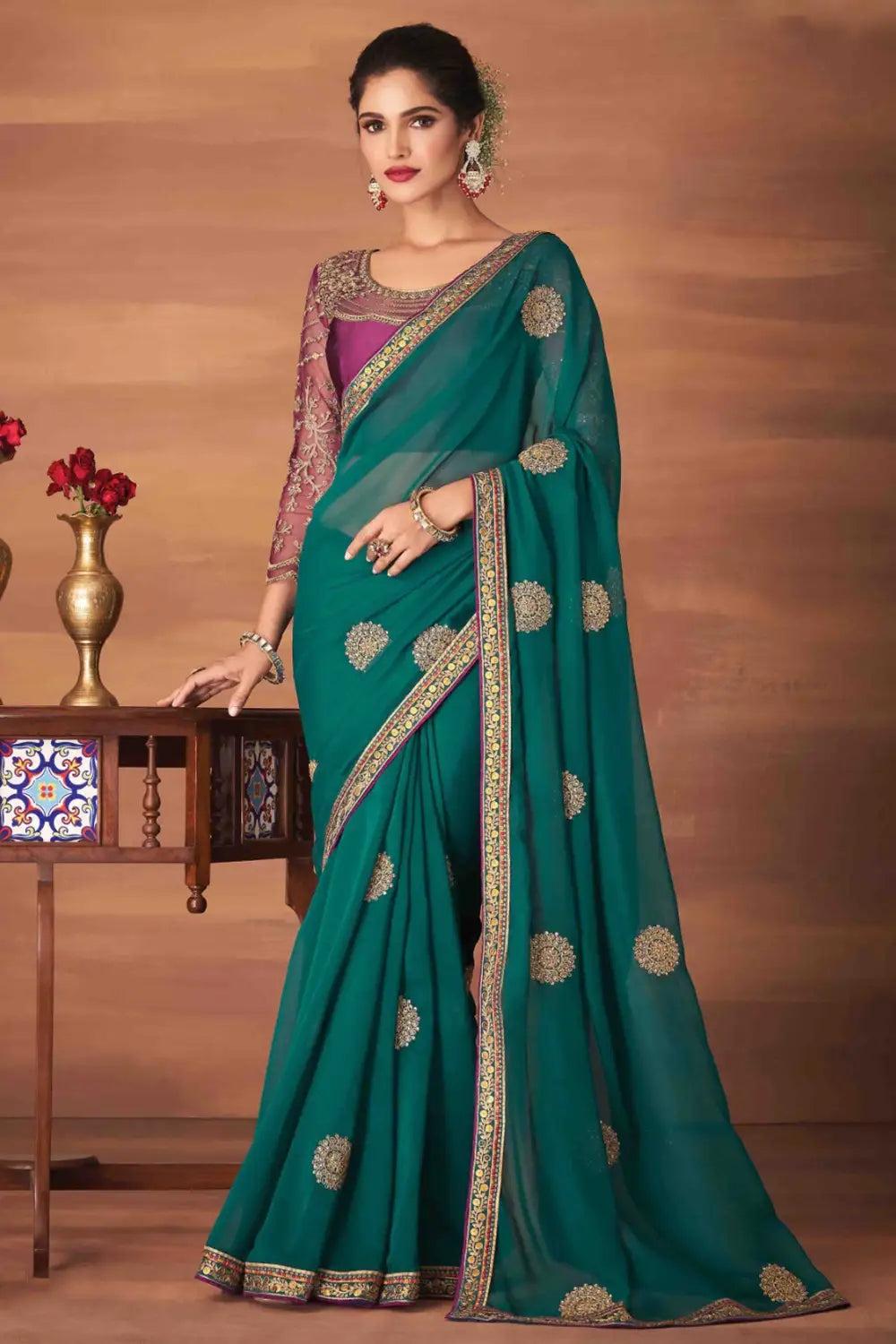 teal blue georgette silk saree with embroidery work