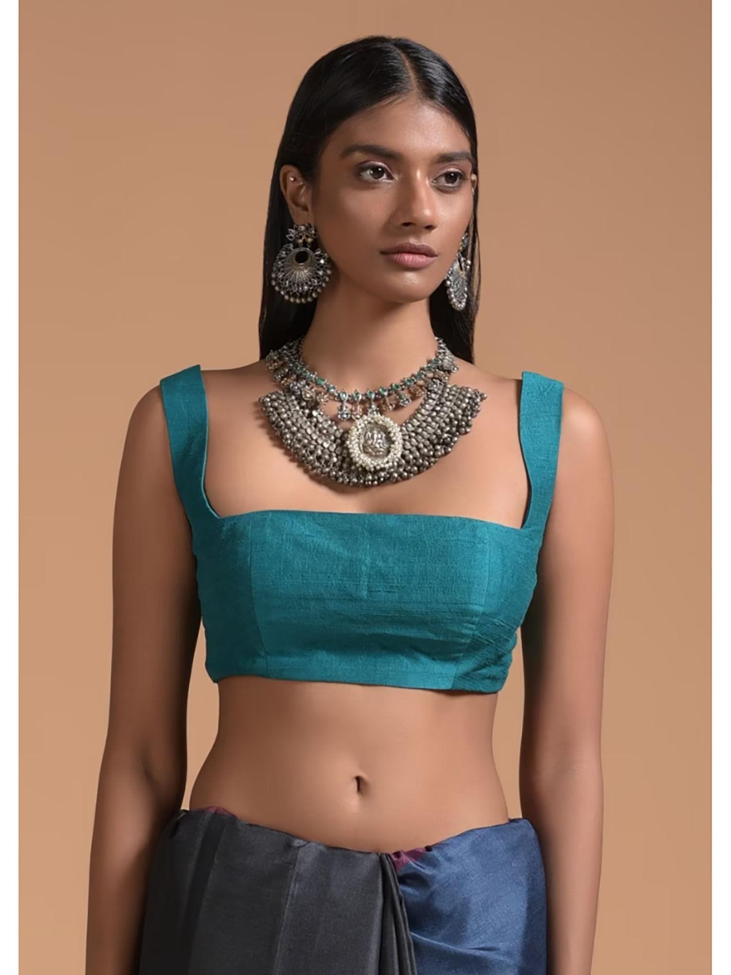 teal blue sleeveless blouse in raw silk with fancy curvy square neckline
