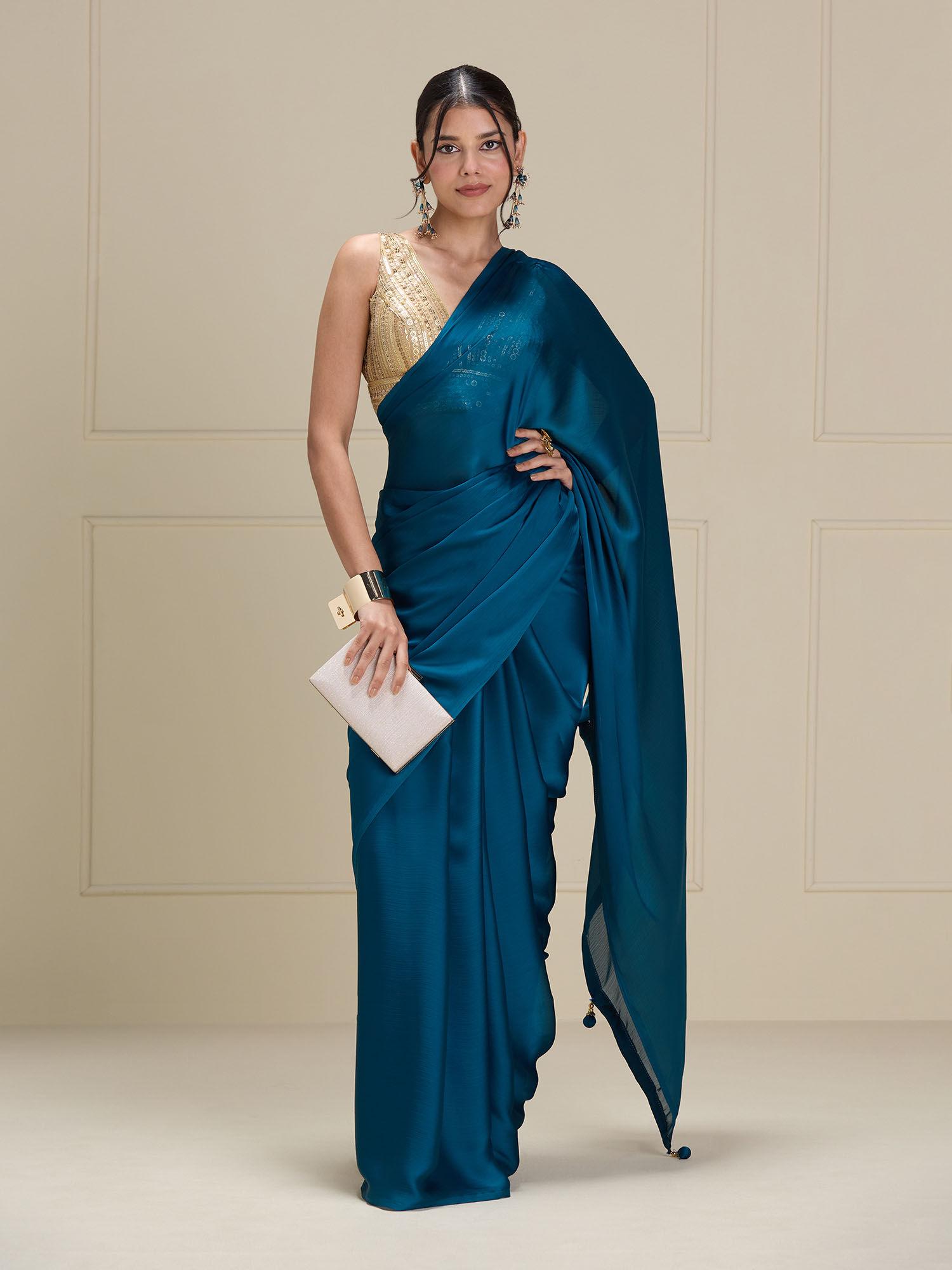 teal georgette solid-plain with tassels party wear saree with unstitched blouse