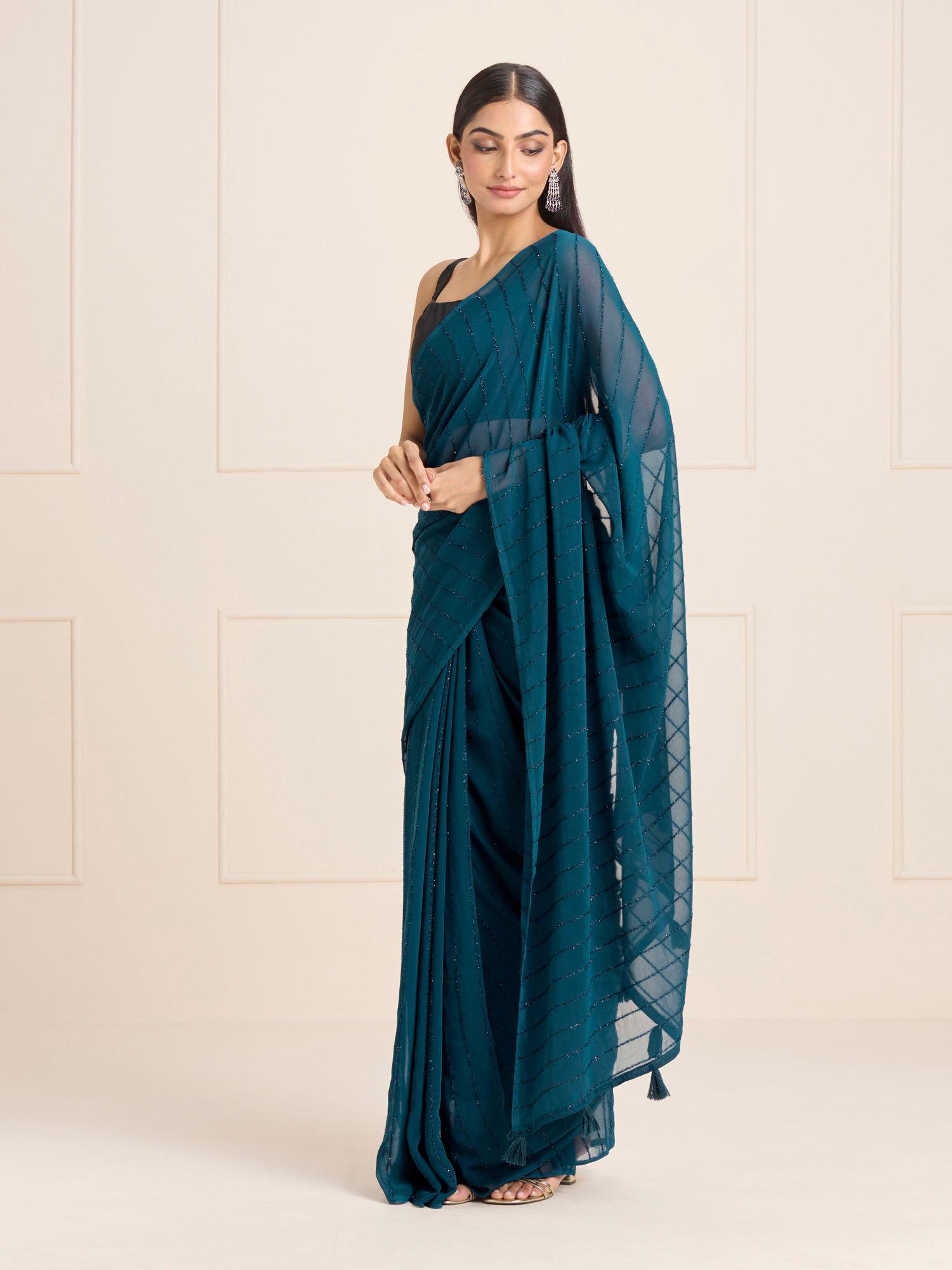 teal georgette stripes tassels festive saree & unstitched blouse