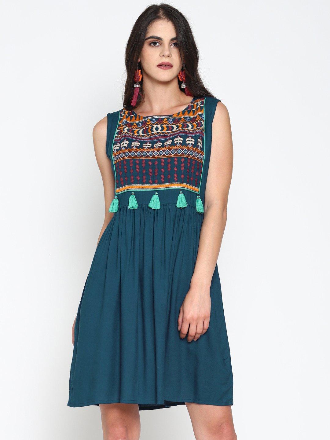 teal skater dress with embroidered yoke