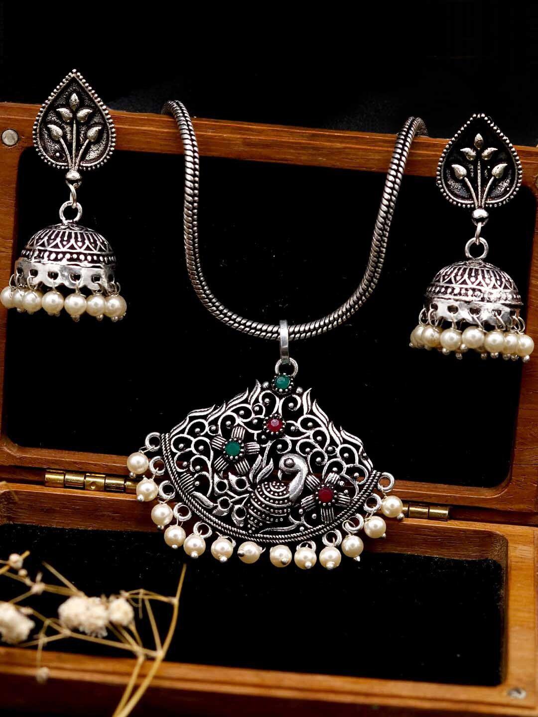 teejh oxidised silver-plated white artificial stone-studded pavaki jewellery set