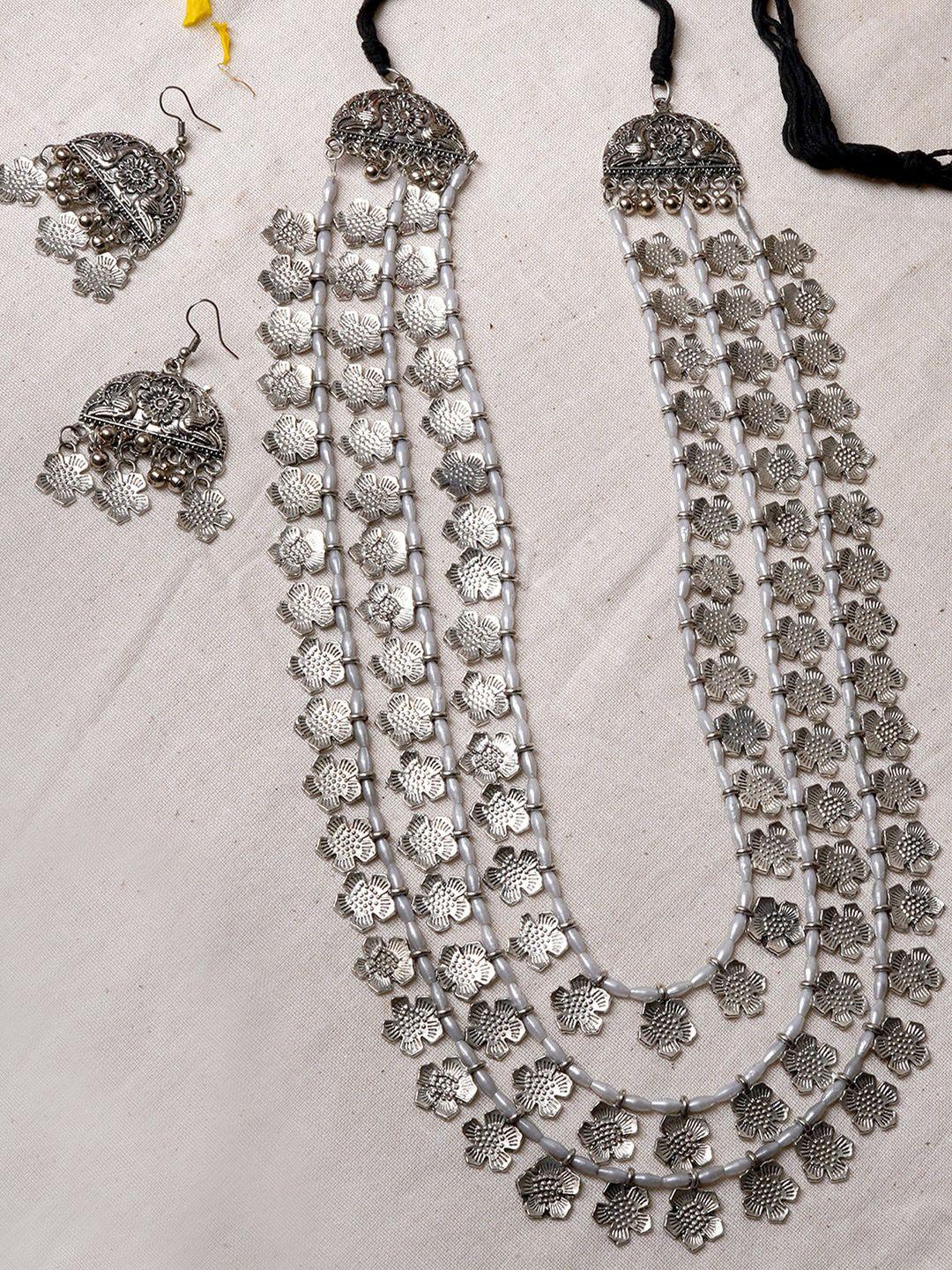 teejh women silver-toned & plated floral oxidised beaded layered jewellery set