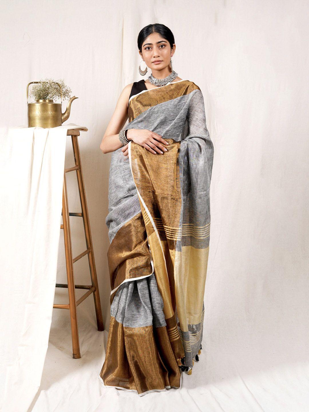 teejh woven design zari saree