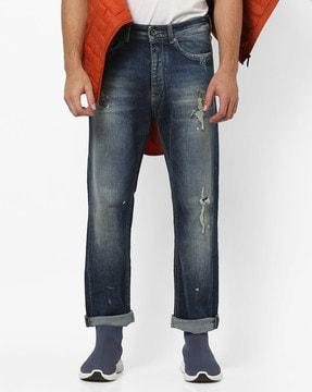 teo lightly-washed tapered fit distressed jeans