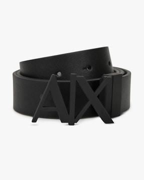 textured belt with buckle closure
