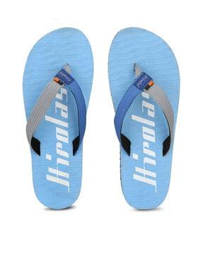 textured flat heel flip flops