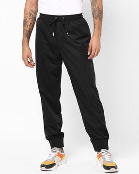 textured mid-rise jogger pants with drawstring waistband